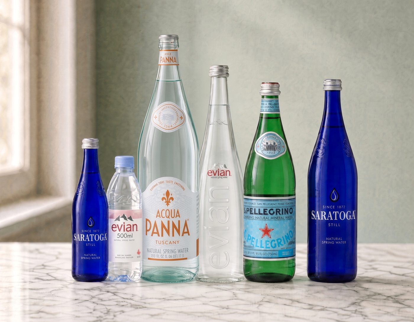 evian, Acqua Panna, S.Pellegrino, and Saratoga in glass